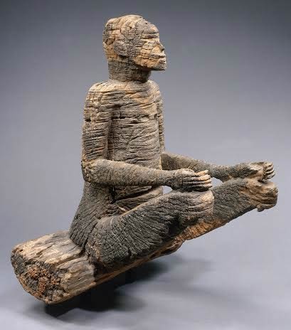 Seated Figure, Mbembe peoples, Ewayon River region, Cross River Province, Nigeria. 17th-18th century | Photograph courtesy of Hughes Dubois, Musée du Quai Branly/Scala/Art Resource, NY and the Metropolitan Museum of Art