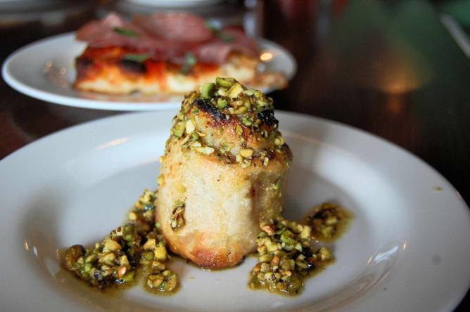 A plate of Rottollo with nuts is part of the fix-prixe menu at Vetri.