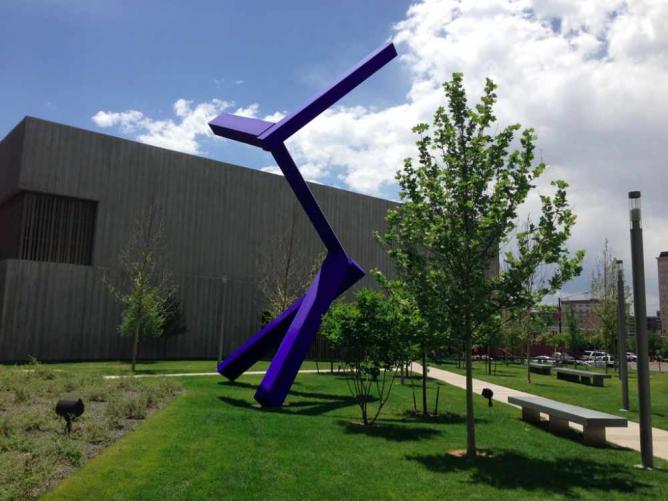 A photo of a sculpture next to the Clyfford Still Museum