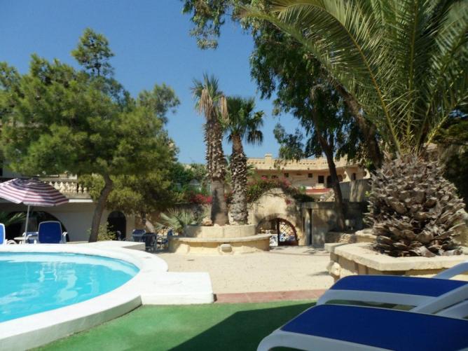 Pool area at Cornucopia Hotel
