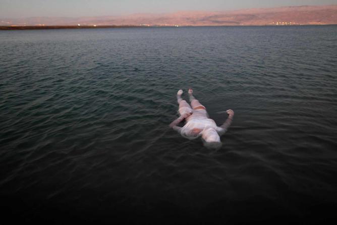 Ariane Littman, Sea of Death 2010,Performance at the Dead Sea, video, Photograph Jim Hollander | © Ariane Littman and Jim Hollander