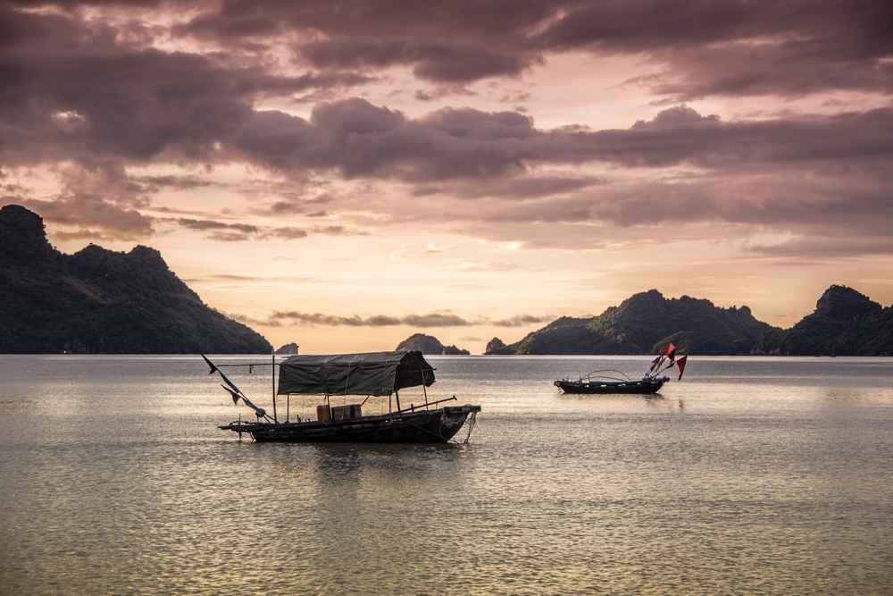 The setting sun in a bay on Cat Ba island | © Dillon Ward/Shutterstock
