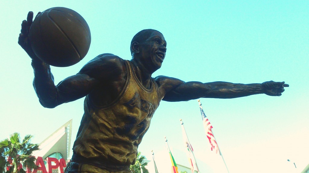 Magic Johnson statue outside Staples center. © Marie Cradle