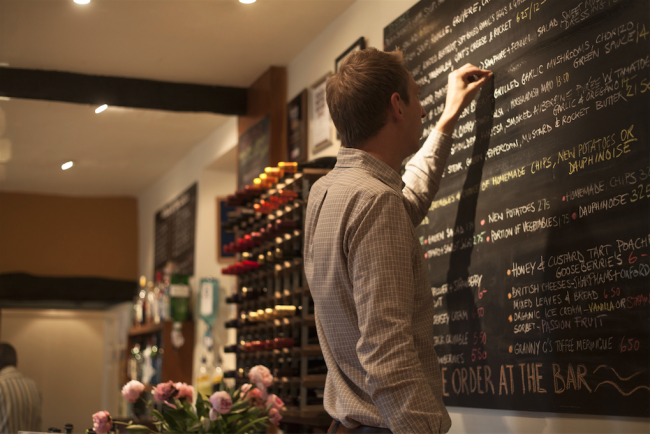 Blackboard Menu being changed by Tom | Courtesy of The Horse and Groom