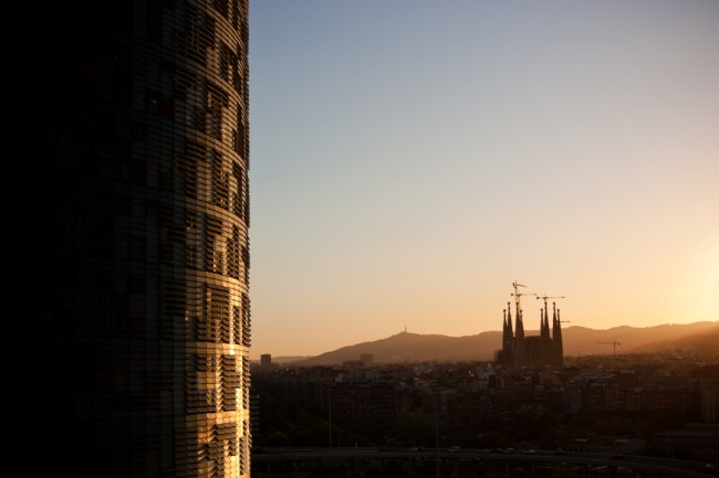 The author has paid for the rights to use this image from iStock. The old and the new: The Torre Agbar towers over Barcelona's technological district, with the Sagrada Familia in the distance. ©iStock.