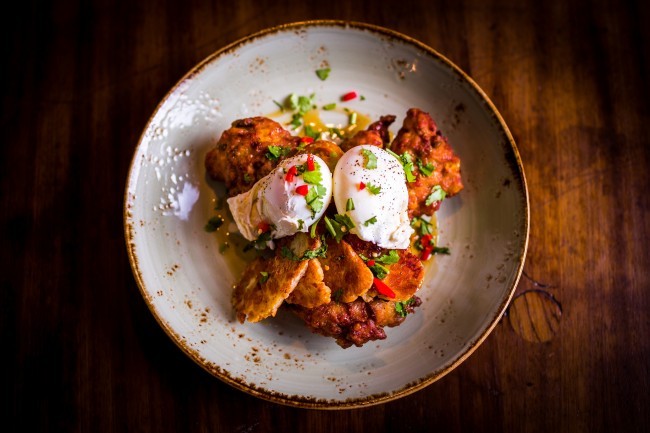 Sweetcorn hash, avocado and poached eggs - one of the Boston Tea Party's most popular dishes | Courtesy of Boston Tea Party