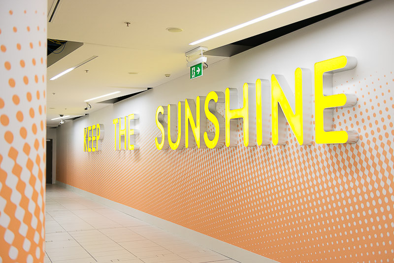 'Keep the Sunshine' by Sebastian Moody - Artwork at Brisbane Airport International Terminal Building Departures area
