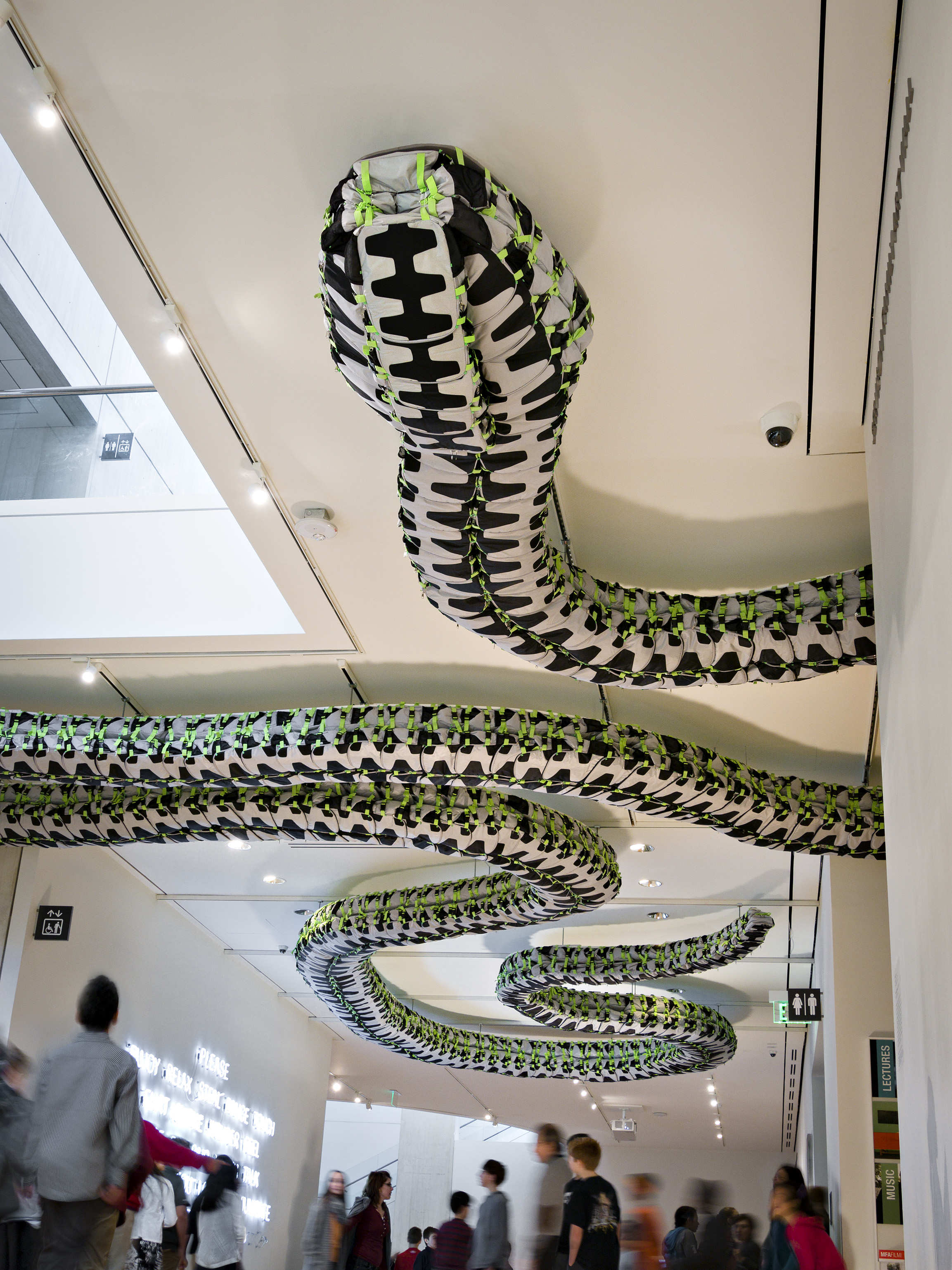 Snake Ceiling, Ai Weiwei (Chinese, born in 1957), 2009. Children’s backpacks, suspended from the ceiling | Image Courtesy of the Collection of Larry Warsh and the Museum of Fine Arts, Boston
