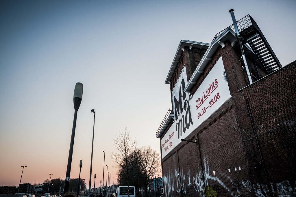 The MIMA façade at dusk | © Gautier Houba / courtesy of the MIMA Museum