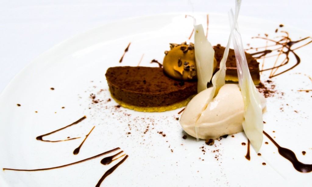 Dark Chocolate Tart paired with Guinness ice cream and topped with Chocolate Sugar | Photo Courtesy of Arcane