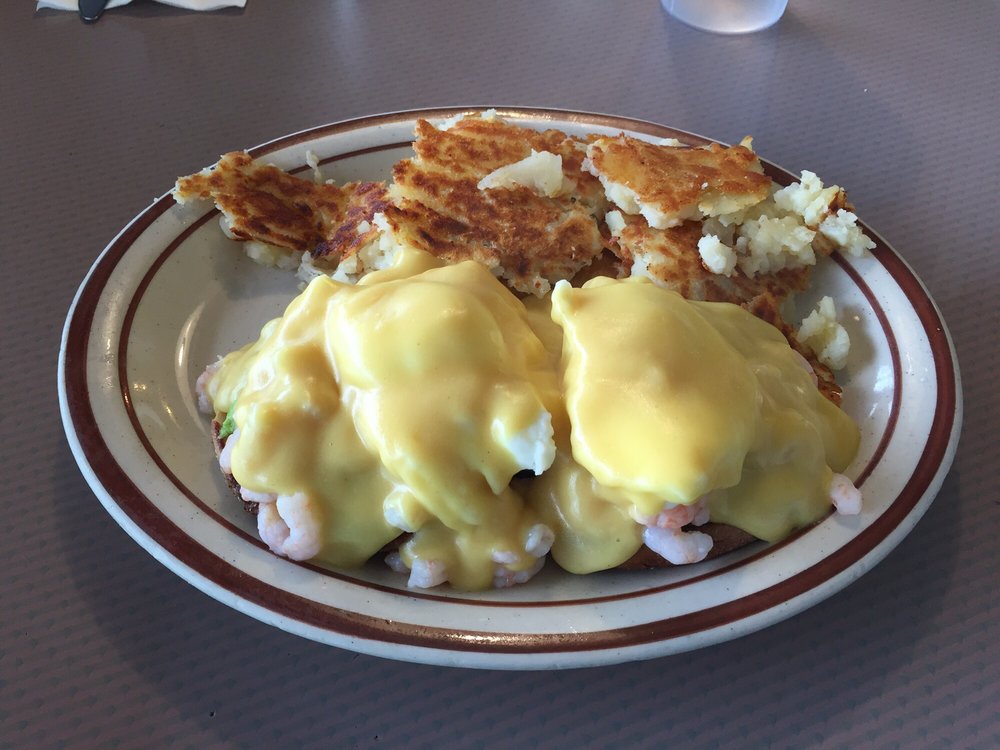 Eggs Benedict with Shrimp & Avocado at Plaza Cafe | Courtesy of Timothy Y./Yelp