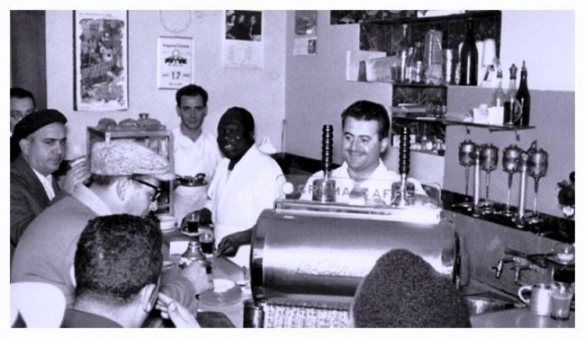 Patrons of the Caffè Triestina in Tripoli enjoying quick shots of espresso at the bar in the 1960’s. |Source: Hani Fteita and Aldo Cicero/Tumblr