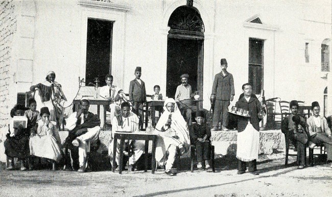 Men only at an Ottoman coffee house in Libya. |Source: “Tripolitania” by Domenico Tumiati 1911