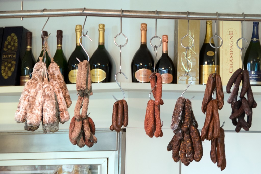 The sausages and cured meats hanging up at the Naschmarkt | © Paul Asman and Jill Lenob / Flickr