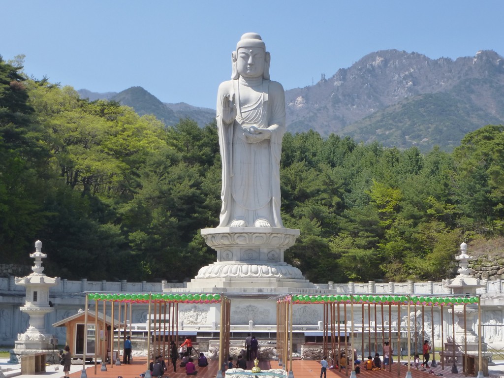 Donghwasa's Unification Buddha towers over the temple grounds | © Jacques Beaulieu / Flickr