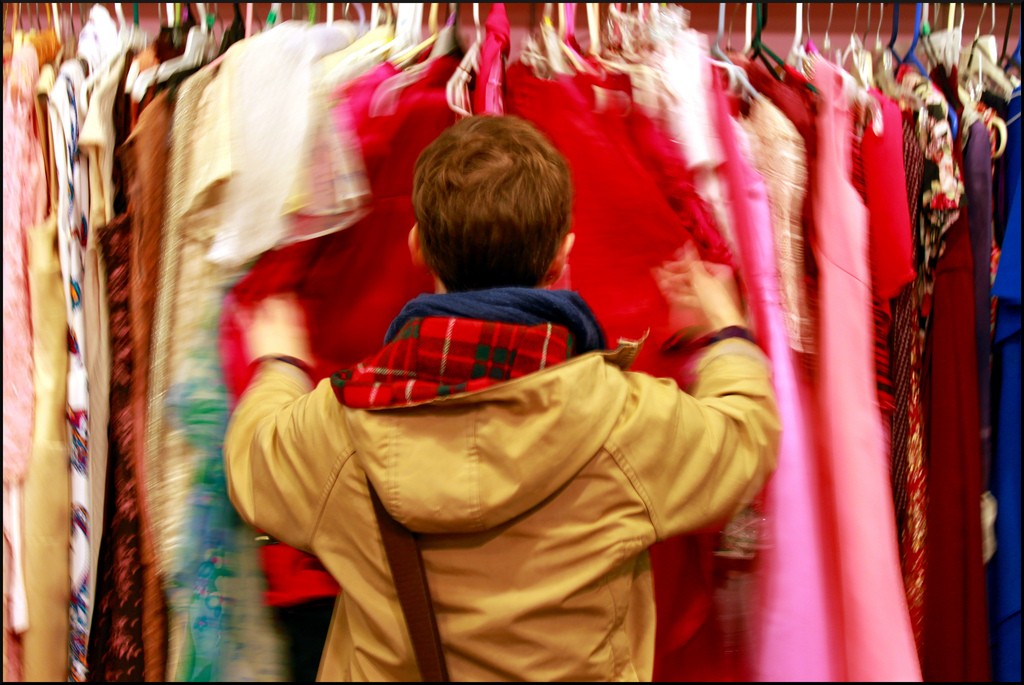 Browsing a vintage clothes rack