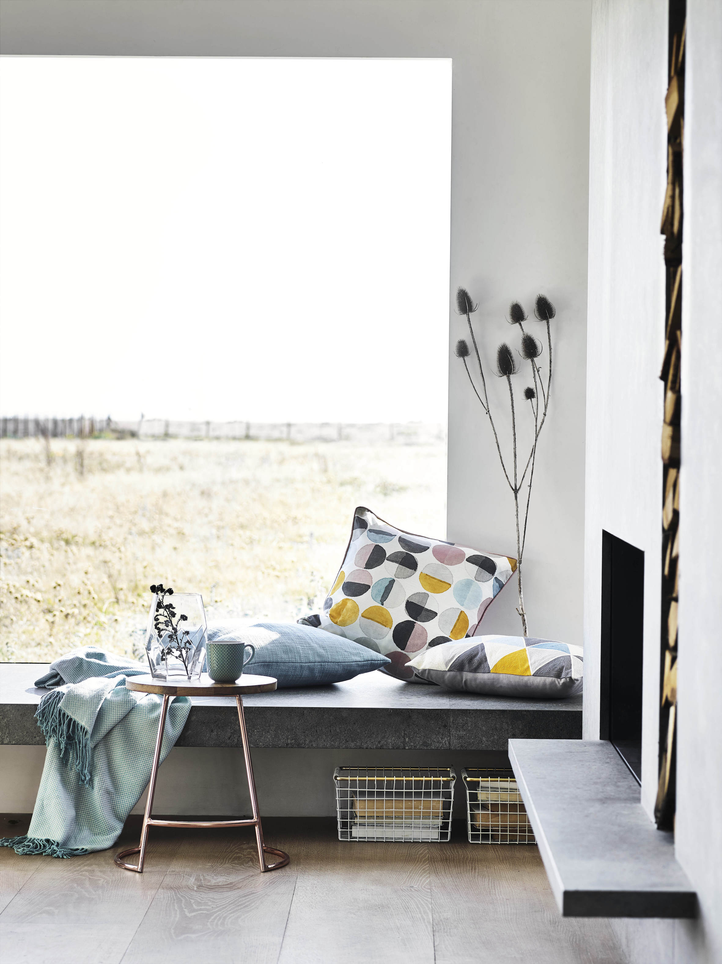 The focus of this room is all about connecting with nature through the large picture window rather than ornamentation | Courtesy of Sainsbury's
