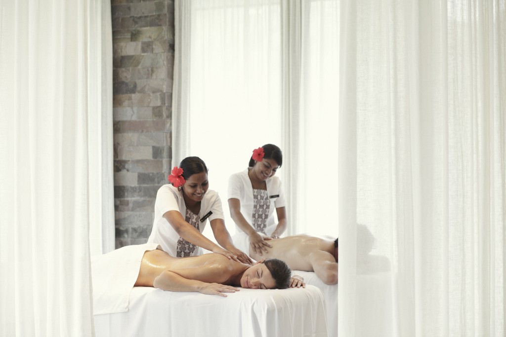 Couples massage in Fiji | Courtesy of InterContinental Fiji Golf Resort and Spa / Flickr
