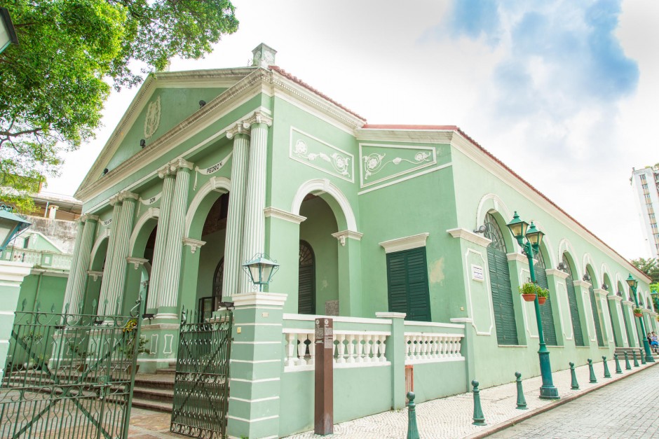 Beautiful mint green exterior of the Dom Pedro V Theatre in Macau