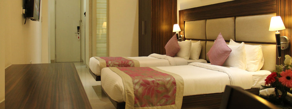 Twin bedroom | Courtesy of Bhawna Clarks Inn