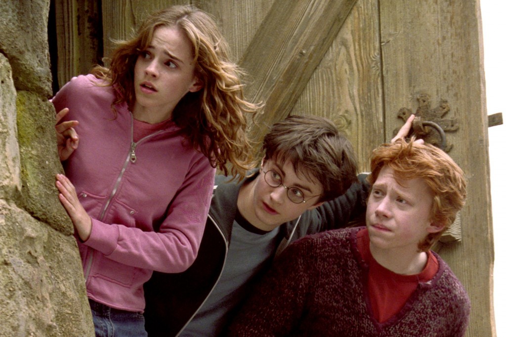 'Harry Potter and the Prisoner of Azkaban' (2004) Emma Watson as Hermione Granger, Daniel Radcliffe as Harry Potter, Rupert Grint as Ron Weasley | © Warner Bros.