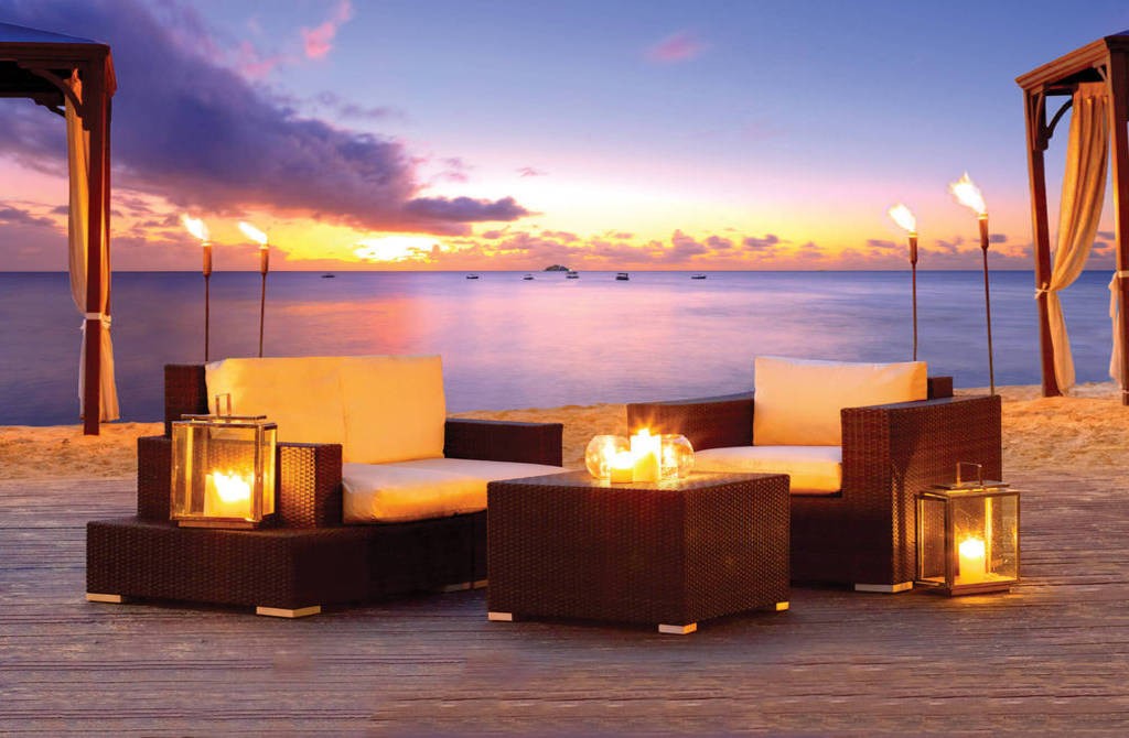 Candlelit Beachside Tables | Courtesy of The House by Elegant Hotels