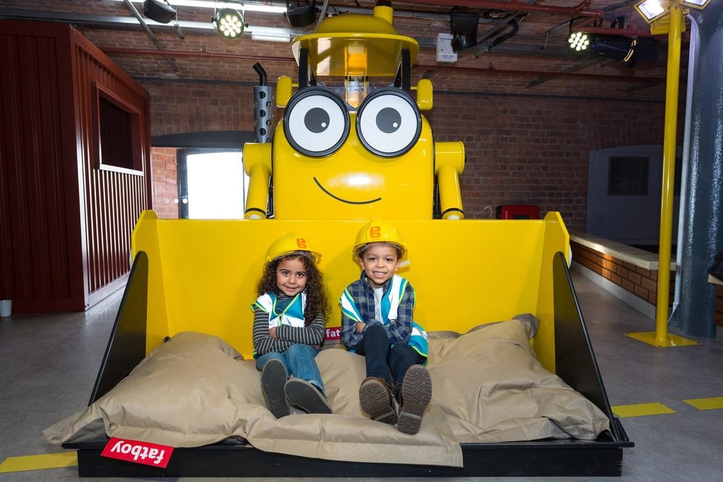 Children on a digger