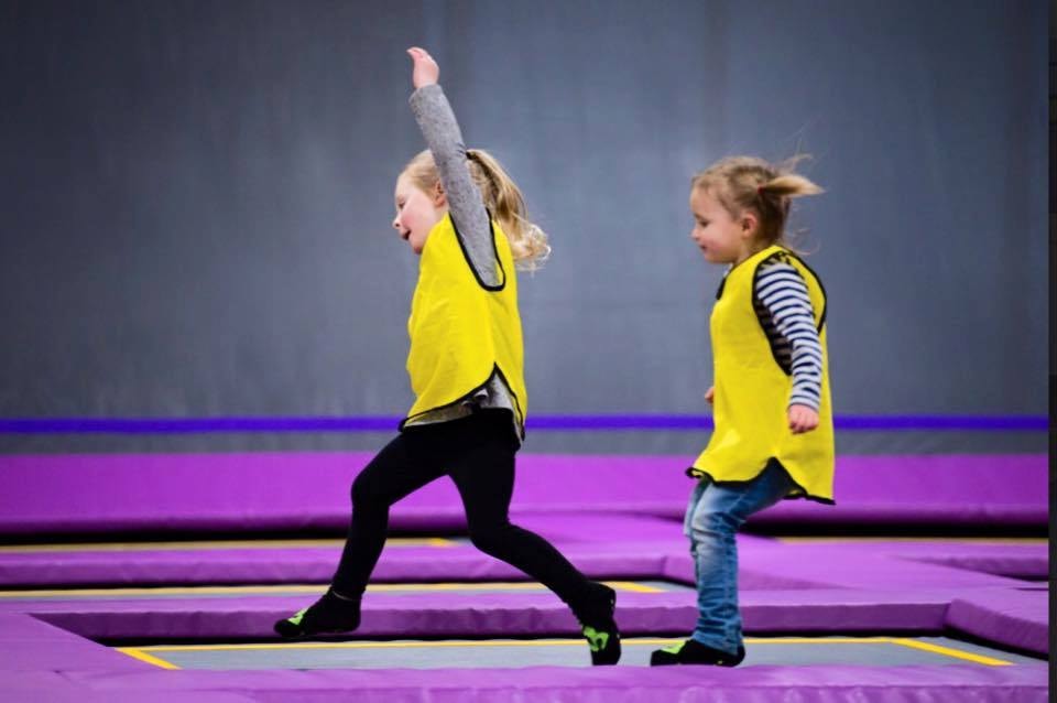 Kids on trampolenes