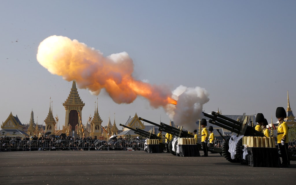 Artillery fire salutes at the start of the royal cremation ceremony in Bangkok | © Rungroj Yongrit/EPA-EFE/REX/Shutterstock