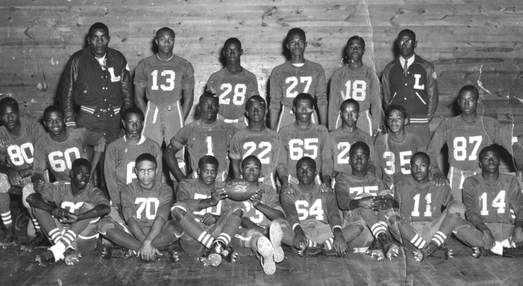 Livingston Dunbar’s 1958 team was coached by James 'Big Jim' Dewalt, led on the field by quarterback Richard Ryans (no. 13) | © Texas University Press