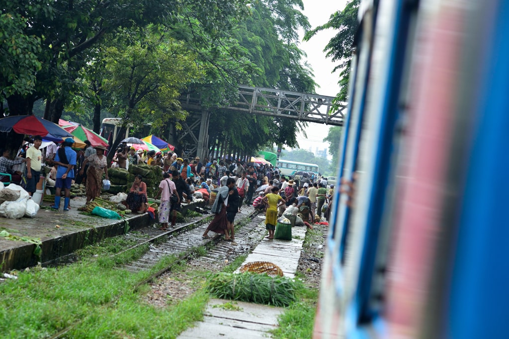 Market-Pouring-over-Train-Tracks-in-Myanmar