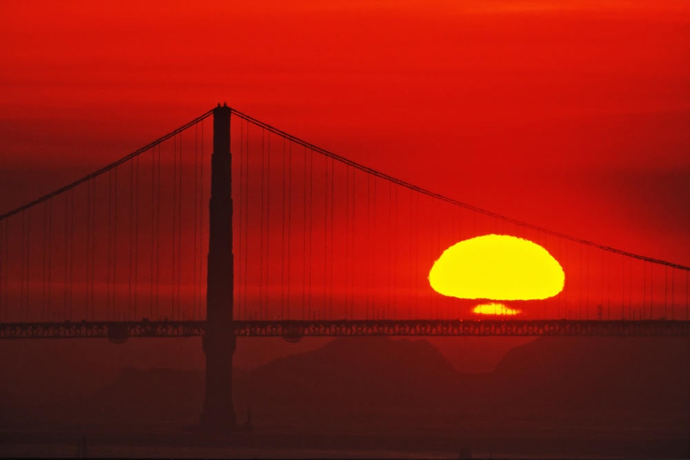 Sunset behind Golden Gate bridge