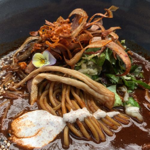 Mole Ramen with handmade noodles and cashew cream