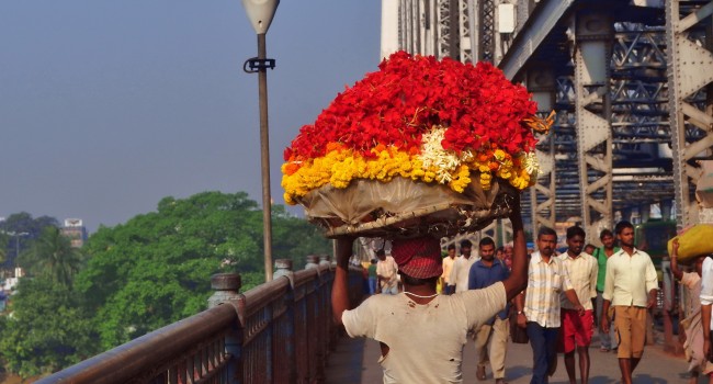 More than 150,000 people walk across the Howrah Bridge every day.