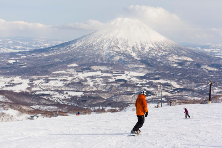 Snowboarders on the ski slopes of Niseko