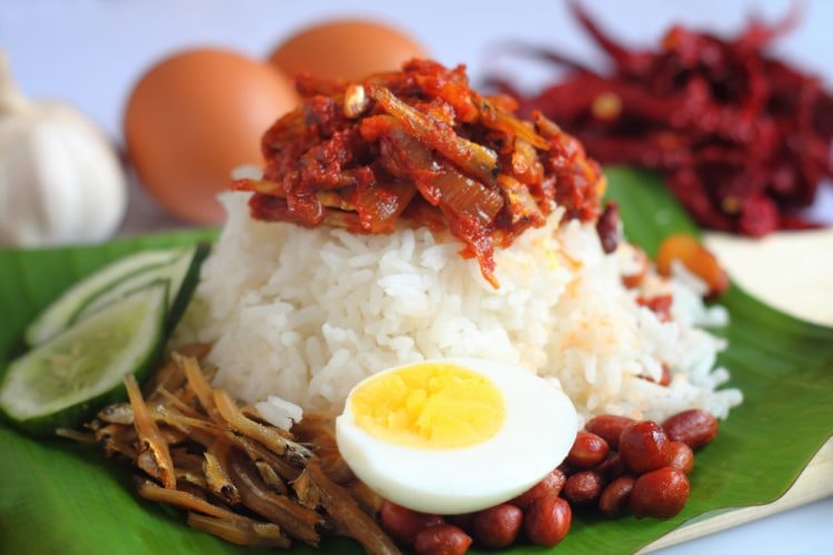 Nasi lemak is a Malay fragrant rice dish cooked in coconut milk and pandan leaf