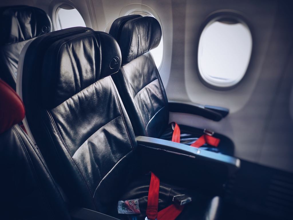 The Truth About Reclining Your Airplane Seat in Economy