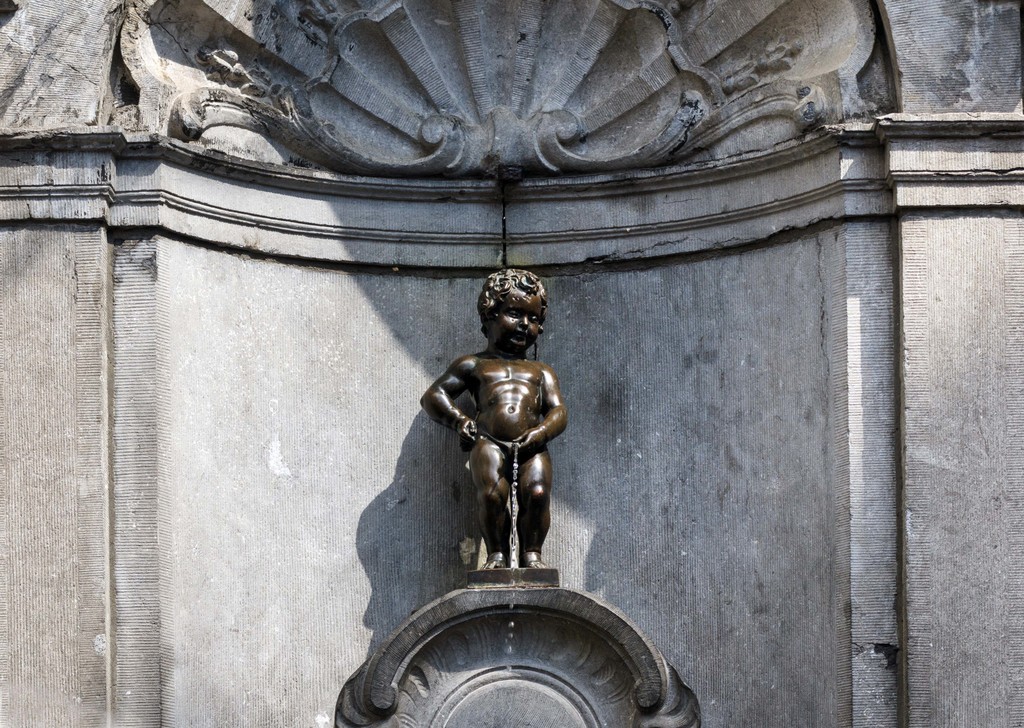 Manneken Pis (Little man Pee), a small bronze sculpture in Brussels, Belgium