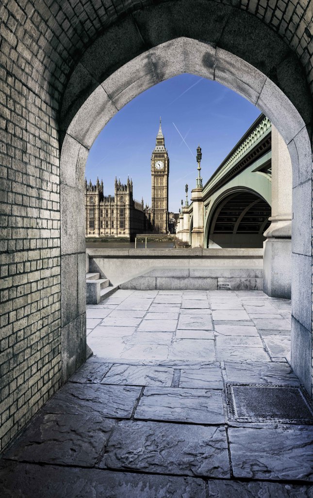 View of Big Ben through the pedestrian tunnel at sunset, London.