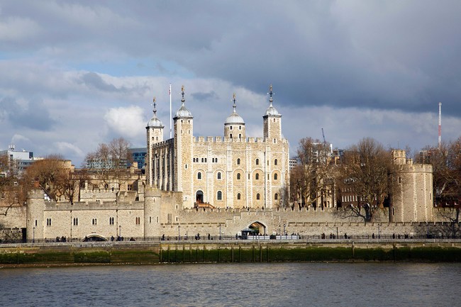 Tower of London and Traitors Gate on the banks of the Thames River. The gate was built by Edward I to provide a water gate entrance to the Tower.