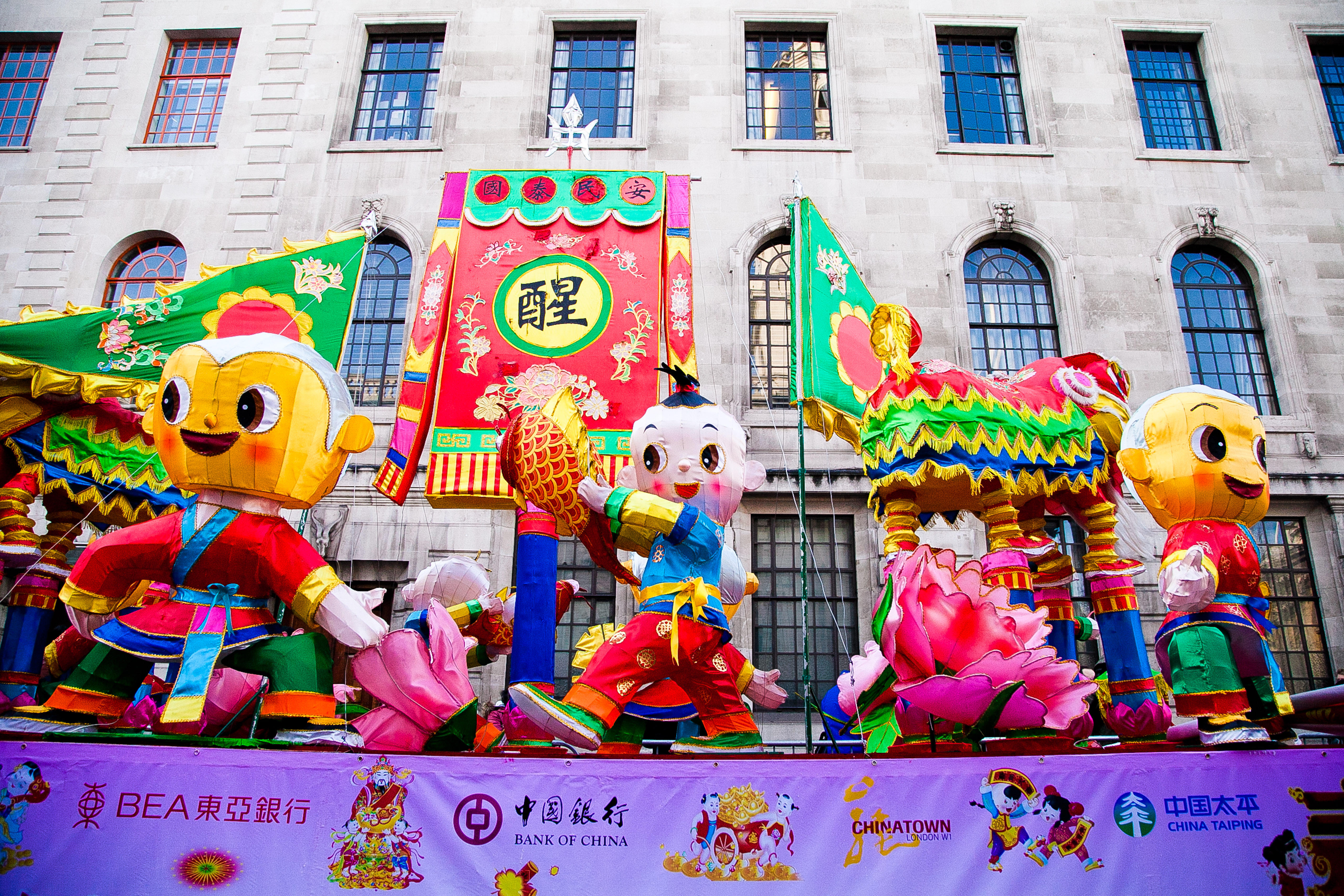 Floats make their way through Trafalgar Square