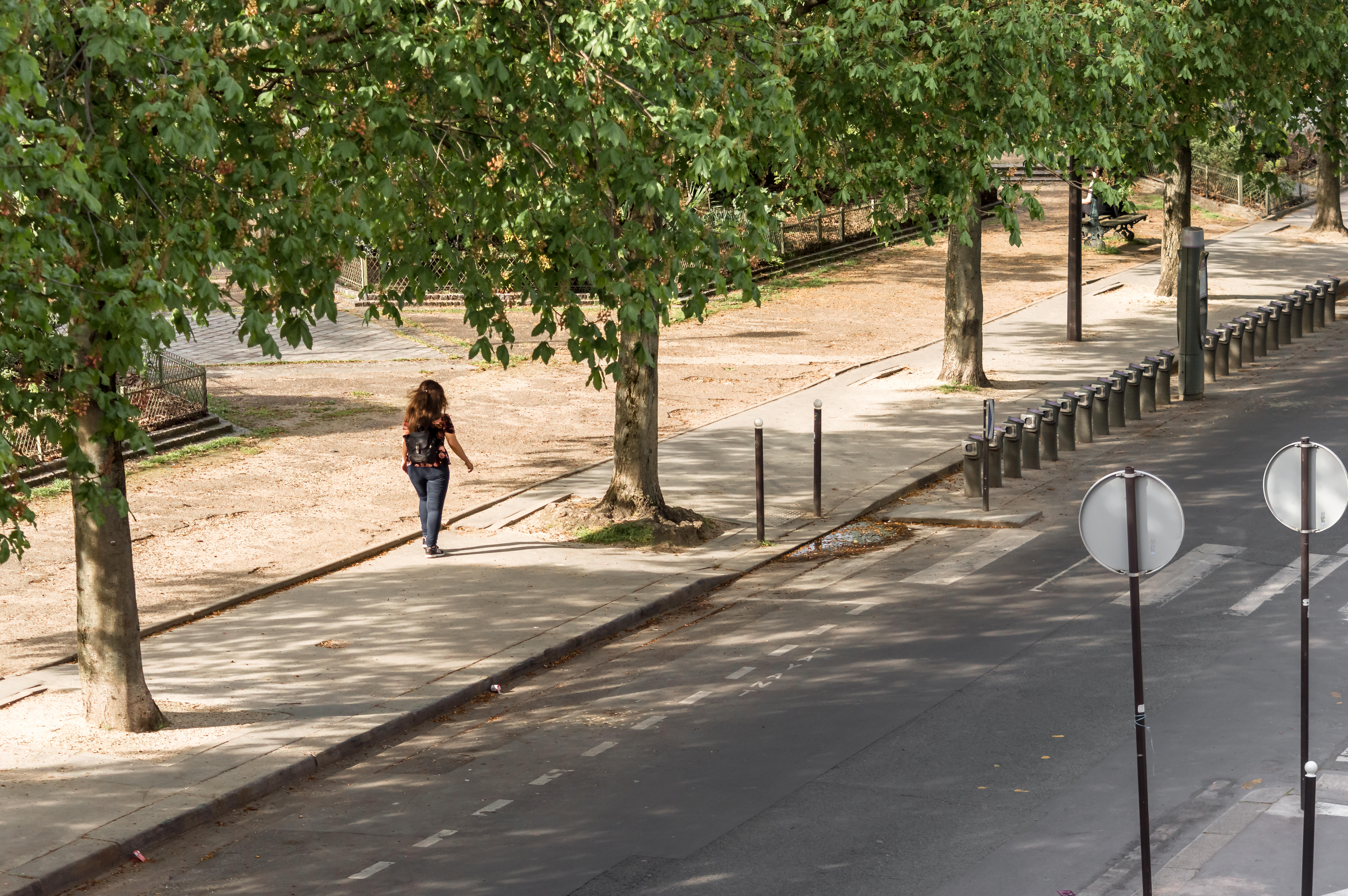 Woman walking in the streets of Paris in the 2eme arrondissement