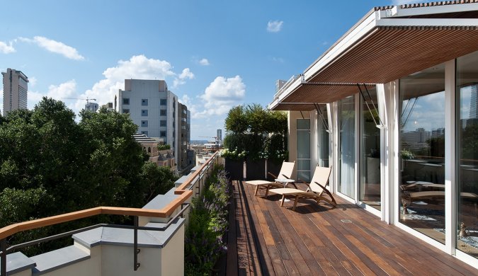 This grand suite has an impressive decked terrace which comes with a hot tub for optimum private luxury, The Norman Hotel, Tel Aviv