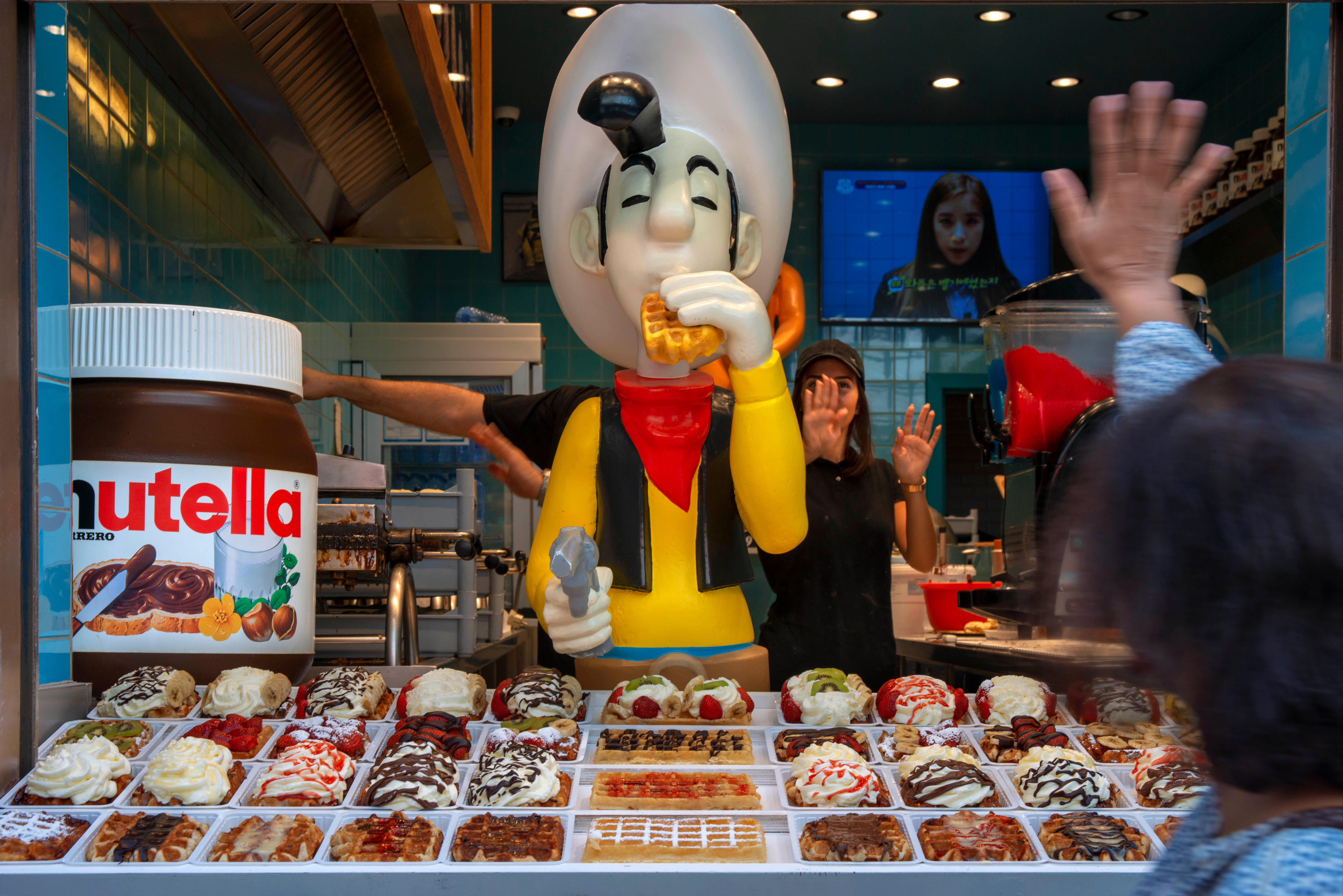 Waffle chocolaterie shop at city center in brussels, Belgium