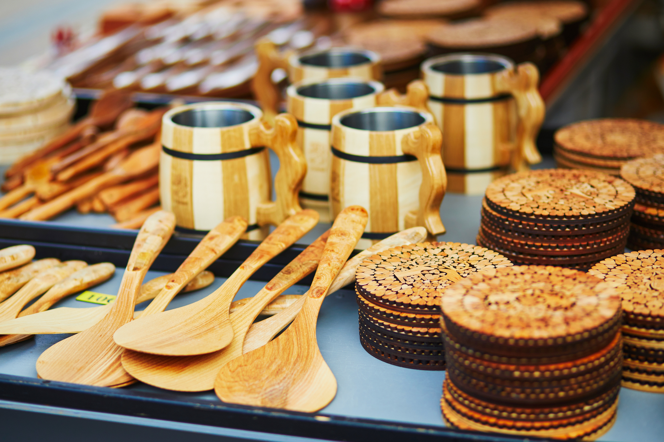 Traditional Finnish wooden beer cups on market