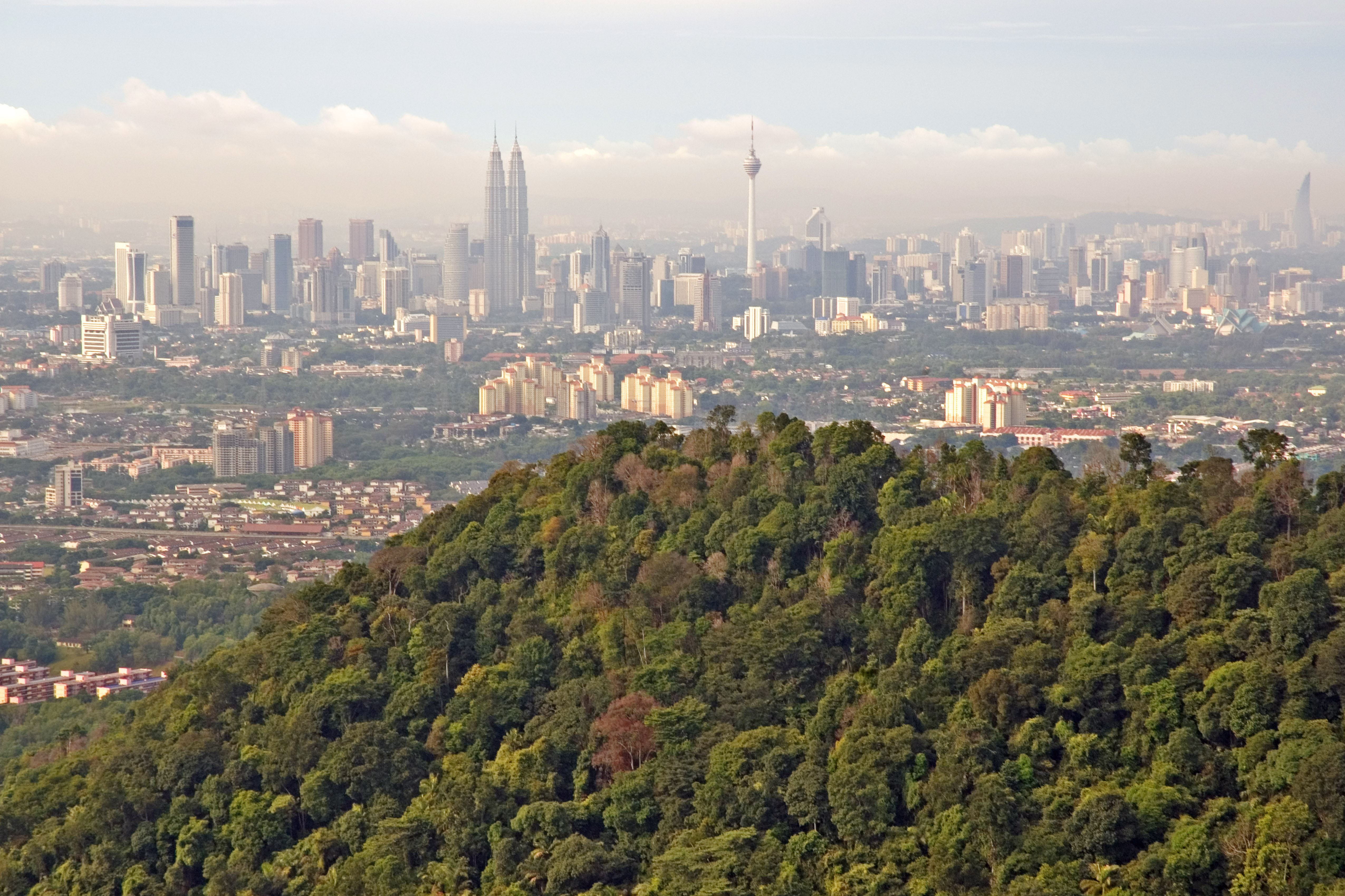 Natural vs Concrete Jungle a view of Kuala Lumpur from Bukit Tabur quartz ridge