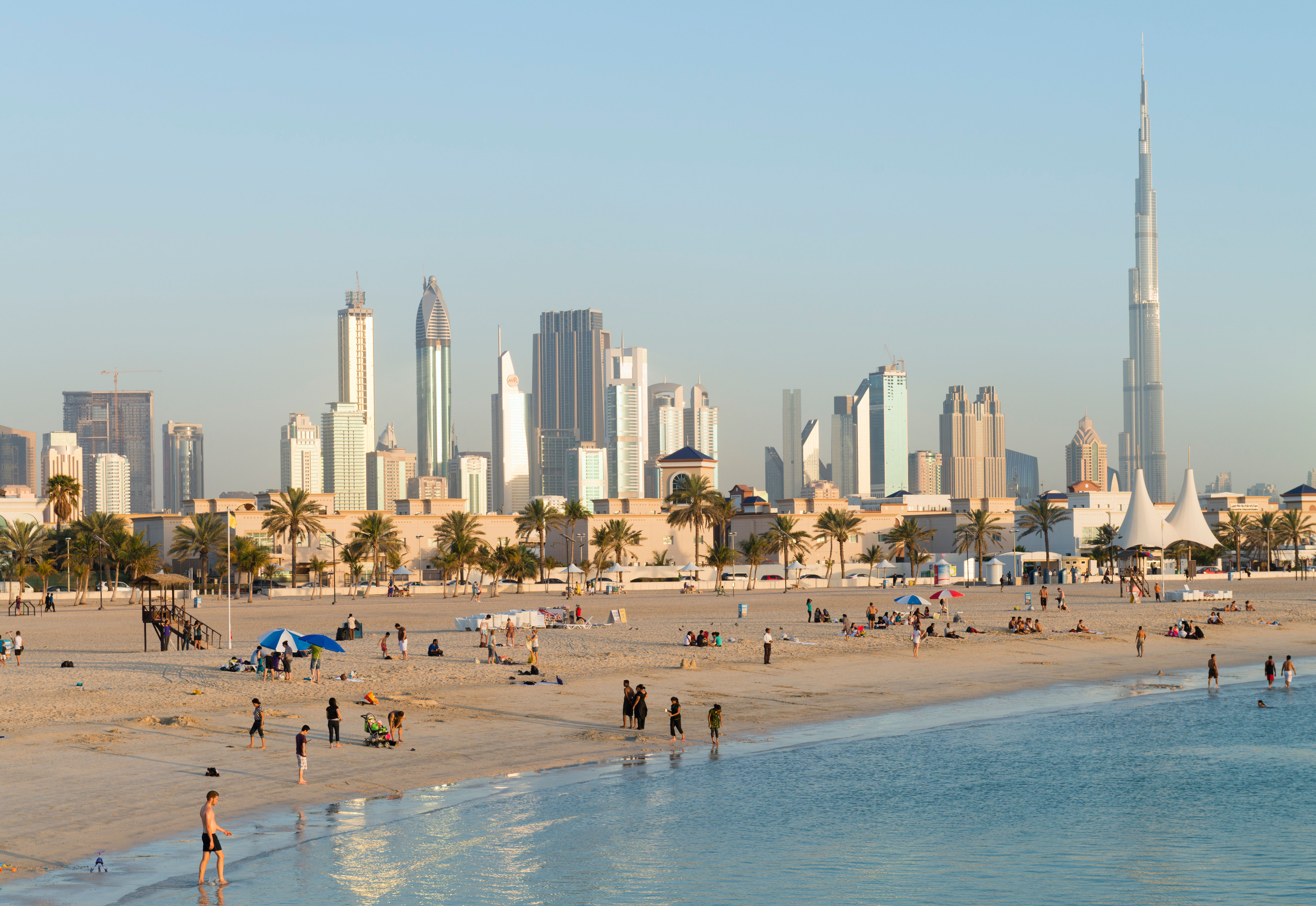 View of modern skyline of Dubai from Jumeirah Open Public Beach in United Arab Emirates UAE