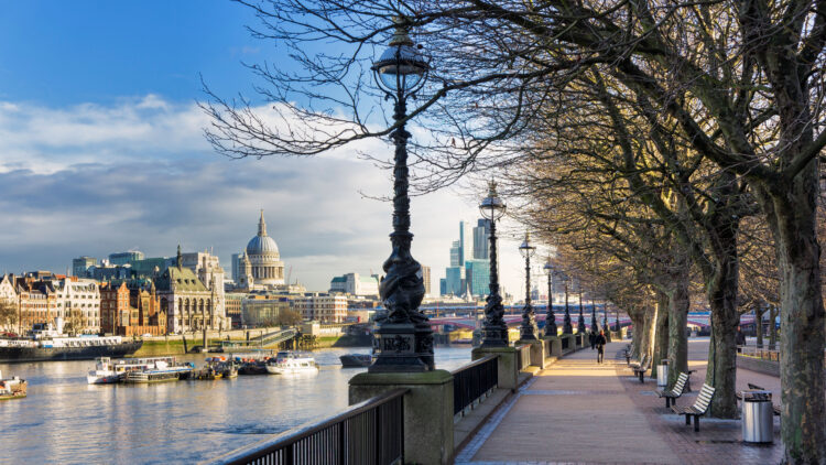 South Bank, London, England, UK - Walking along Southbank of the River Thames towards St Paul's on the Queens Walk