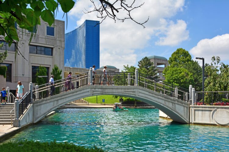 Indianapolis IN, USA 06- 30-18 Downtown Indy Canal Walk has about 3 water miles for the enjoyment of pedal boats, bicycles, gondolas and even Segways